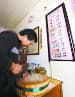 Preparing donkey burgers with price list in ancient
Chinese coins hanging on wall