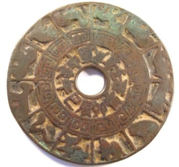 Reverse side
            of "jia guan jin lu" charm with animals of the
            Chinese zodiac