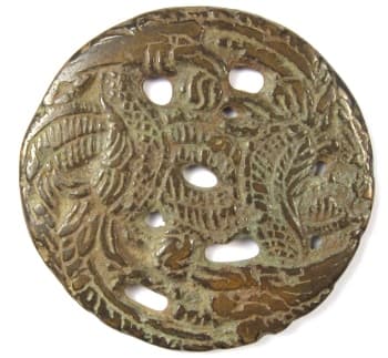 Old Chinese open work charm showing
              two phoenix