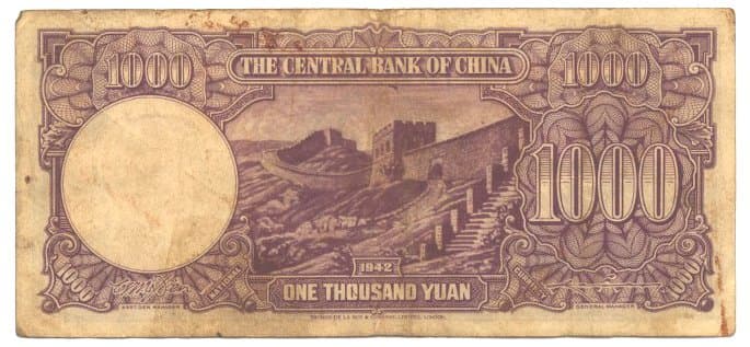 Chinese paper
        money of "1000 Yuan" (one thousand dollars) issued
        in 1942 by the Central Bank of China with an image of the
        Great Wall of China